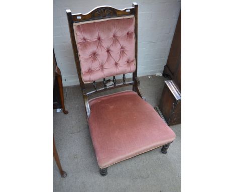 An Edwardian Button back chair with pink upholstery 