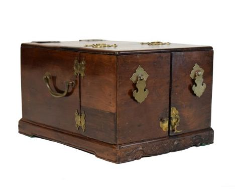 19th Century Chinese brass mounted hardwood dressing box, the hinged cover enclosing drawers before hinged double doors with 