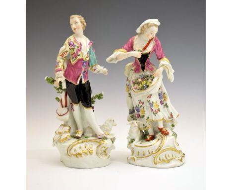 Pair of 19th Century German porcelain figures, probably Anspach, depicting a young gallant and lady, each with a lamb at thei