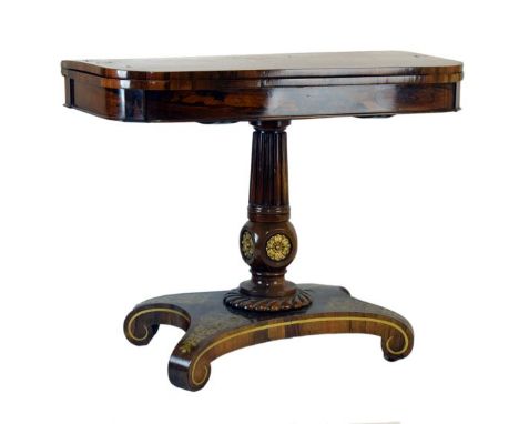 George IV brass inlaid rosewood fold over pedestal card table, in the manner of Thomas King, the top with rounded front corne