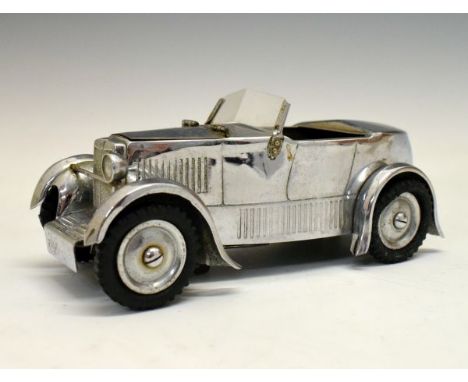 Rare Dunhill 'Bolide' table cigarette lighter in the form of a vintage motor car, chrome cased, 16cm long  Condition: One hea