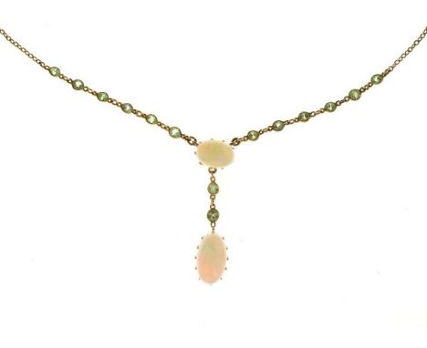 Edwardian opal and green stone necklace, the chain with a frontispiece of twelve spectacle set stone with an opal to the cent