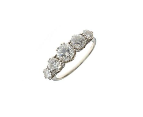 Five stone diamond ring, the white metal mount stamped '750 18ct', the graduated brilliant cuts totalling approximately 1.9 c