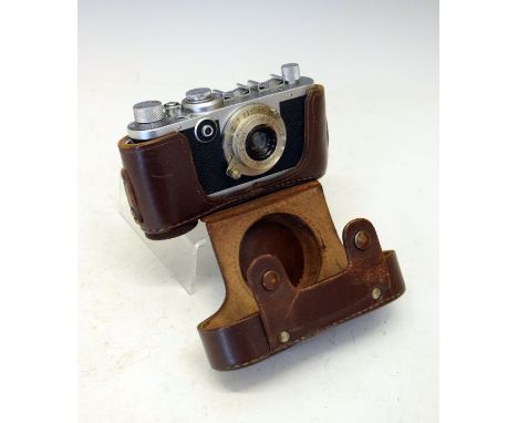 Leica If serial No.564262 (1951),  having a Leitz Elmar I:3,5 F=50mm lens, in a Leica brown leather case  Condition: Shutter 
