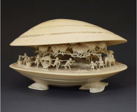 Large early 20th Century Chinese ivory Clams Dream carving, the interior typically decorated with a rural scene with a proces