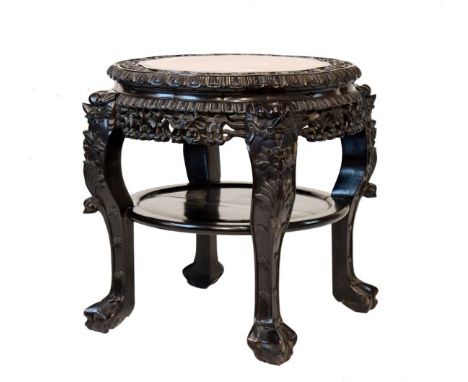 Early 20th Century Chinese marble top carved hardwood occasional table or vase stand, the eight lobed top with red variegated