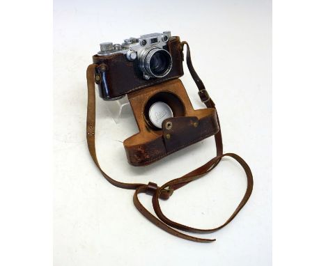 Leica IIIc Serial No.517292 (1950), having a Summitar f=5cm 2:2 lens, Serial No.787671, in a Leica brown leather case  Condit