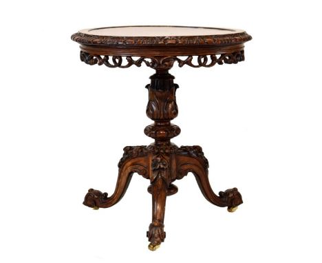 Mid 19th Century carved walnut circular snap top occasional table, the dished top with carved border and scroll-pierced apron