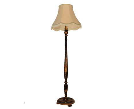 Early 20th Century black lacquered chinoiserie standard lamp, the turned stem and circular base both decorated with figures, 
