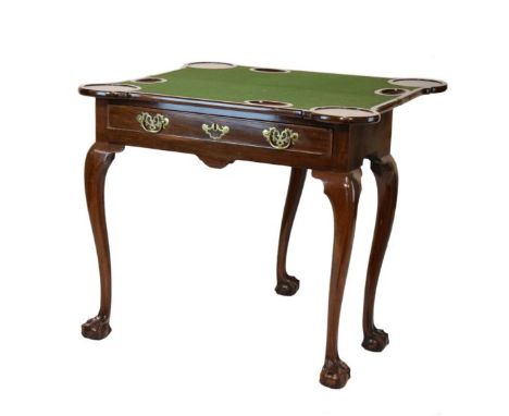 Mid 18th Century mahogany fold over card table, the oblong top with lobed front corners enclosing green baize-lined playing s