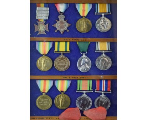 Medals - Display of mainly World War I 'family group' medals - World War I group of four comprising: 1914-1918 Medals, Victor
