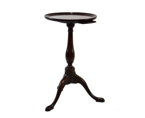 George III mahogany kettle stand, the dished circular top with pull-out slide beneath on slender turned column and tripod sup