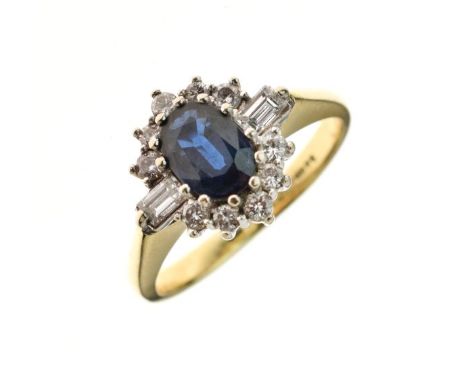 Diamond and sapphire 18ct gold ring, the oval cut sapphire enclosed by five brilliant cuts above five below and a baguette di