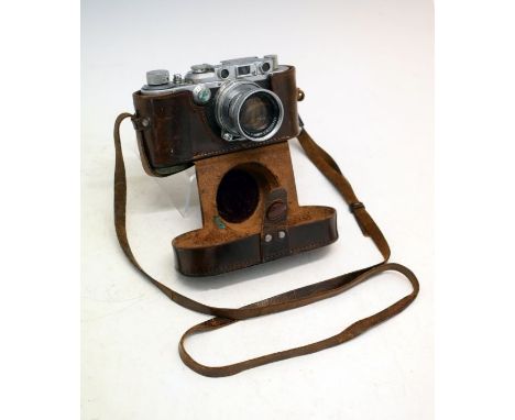 Leica IIIa Serial No.279735 (1938),  having a Summicron f=5cm 1:2 lens Serial No.1156703, in a Leica brown leather case  Cond
