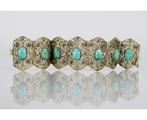 A Vintage Egyptian Filigree Base Metal and Faience Scarab Beetle Panel Bracelet, Seven Six Sided Panels Measuring 43mm by 24m