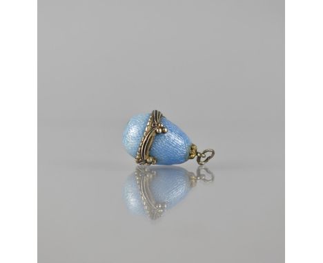 A Small Guilloche Enamelled and Silver Mounted Egg, Pale Blue Enamel with Stylised Ribbon Band, Stamped to Bale, In the Manne
