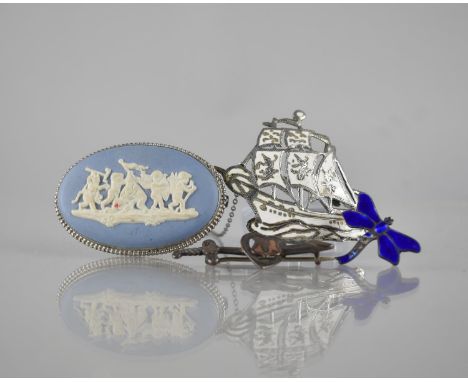 Four Silver Mounted Brooches to include Continental Blue Guilloche Enamel Dragonfly, Siam Sterling Sailing Ship with White En