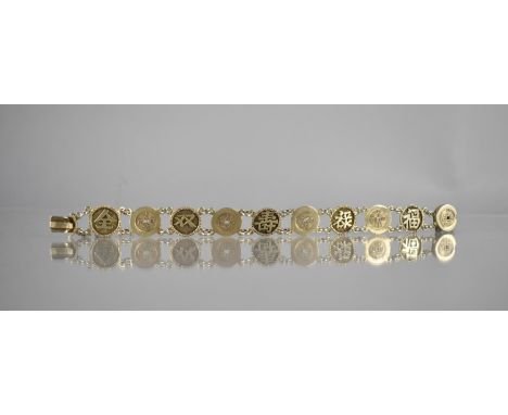 A Gilt Metal 9 Panel Bracelet, Chinese Character and Tokens, Circular Panels Measuring 5mm Diameter, 19cms Long Max, Unmarked
