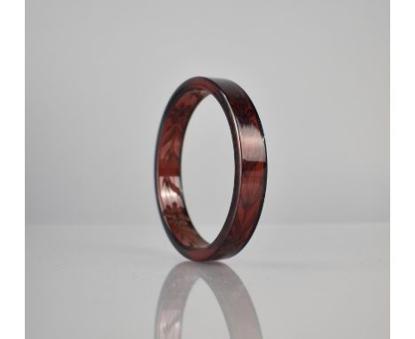A Cherry Bakelite Bangle, Etched to the Interior with Floral Design, 14mm Wide, Internal Dimension 73mm, 27gms 