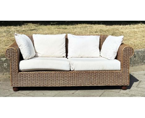 CANE/CONSERVATORY SOFA, woven cane with scroll arms and linen covered cushions, 200cm W. 