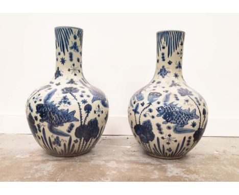BOTTLE NECK VASES, a pair, Chinese style blue and white ceramic, 56cm H x 38cm W. (2) 