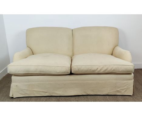 SOFA, Howard style in cream fabric on beech legs and castors, 90cm H x 184cm W x 107cm D. 