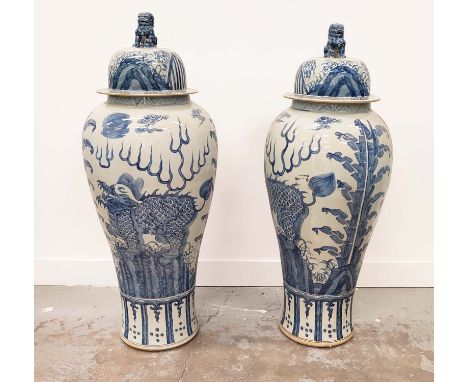 TEMPLE JARS, a pair, Chinese style blue and white ceramic, 110cm H x 42cm W. (2) 