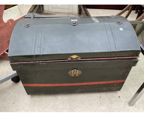 A VICTORIAN TIN DOMED TOP TRUNK 