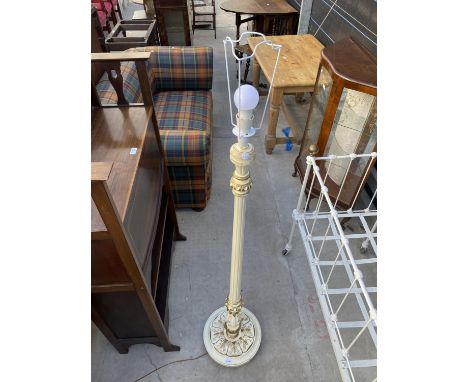 A MODERN CREAM AND GILT STANDARD LAMP 