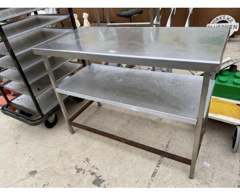A STAINLESS STEEL KITCHEN WORK BENCH 