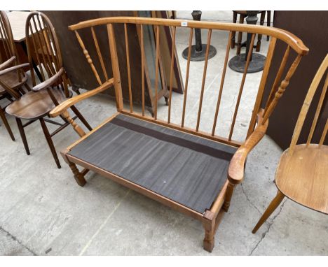 AN ERCOL STYLE WINGED COTTAGE SETTEE 