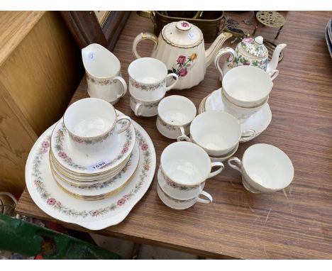 AN ASSORTMENT OF CERAMIC WARE ITEMS TO INCLUDE PARAGON TRIOS AND TWO TEAPOTS ETC 