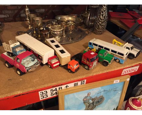 AN AMOUNT OF TRUCKS AND VEHICLES TO INCLUDE BUDDY L AND MATCHBOX 