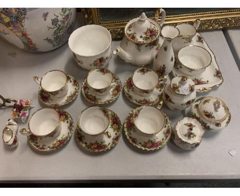 TWENTY TWO PIECES OF ROYAL ALBERT OLD COUNTRY ROSES TO INCLUDE SIX CUPS AND SAUCERS, TEAPOT, MILK AND SUGAR, VASE, LIDDED POT