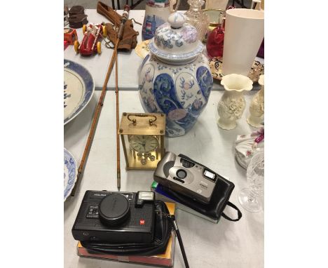 AN ORIENTAL STYLE LIDDED GINGER JAR, MARKED TO BASE, VARIOUS CAMERAS AND AN H. SAMUEL BRASS CARRIAGE CLOCK 