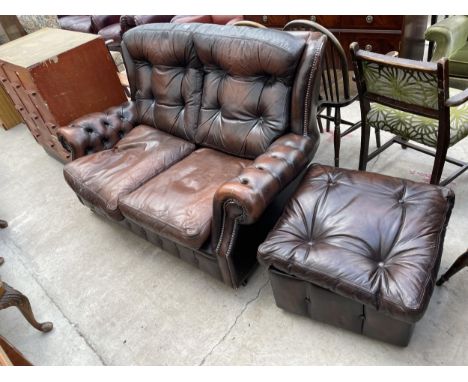 A BROWN LEATHER BUTTON-BACK SETTEE AND MATCHING POUFFE 