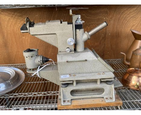 A VINTAGE NATCHET MICROSCOPE WITH VARIOUS LENSES 