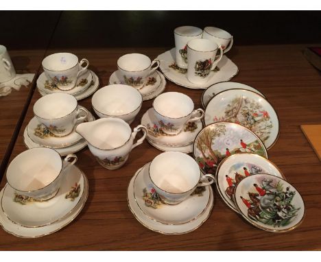 A QUANTITY OF BONE CHINA CUPS, SAUCERS, PLATES, ETC WITH A HUNTING SCENE 