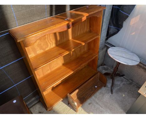 AN OPEN PINE BOOKCASE, ART DECO BOOK TROUGH AND MARBLE TOP TRIPOD TABLE 