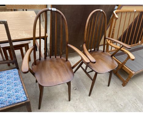A PAIR OF ERCOL STYLE ELBOW CHAIRS 