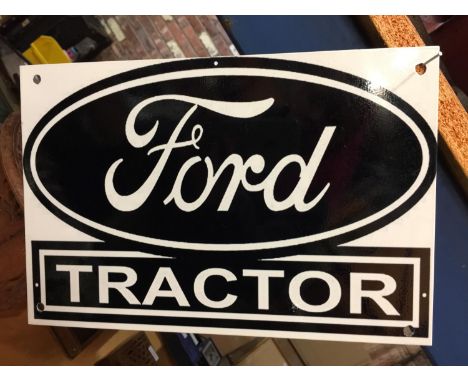A METAL 'FORD TRACTOR' SIGN 