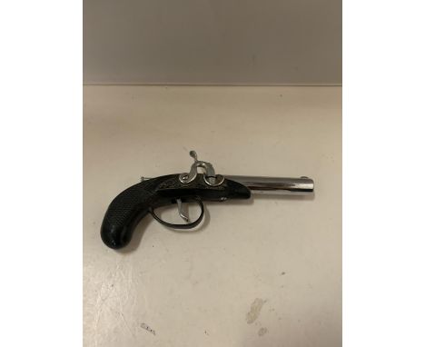 A CIGARETTE LIGHTER IN THE FORM OF A PISTOL 