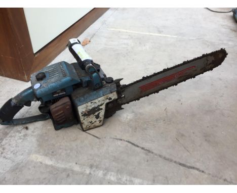 A VINTAGE PETROL CHAINSAW 
