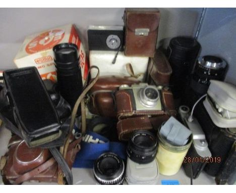 Vintage cameras and lenses to include a Solda I camera and a Chinon 