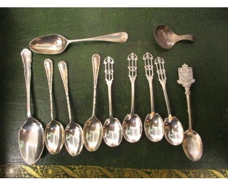 Eleven silver spoons to include a George III tea caddy spoon, a preserve spoon and various teaspoons 