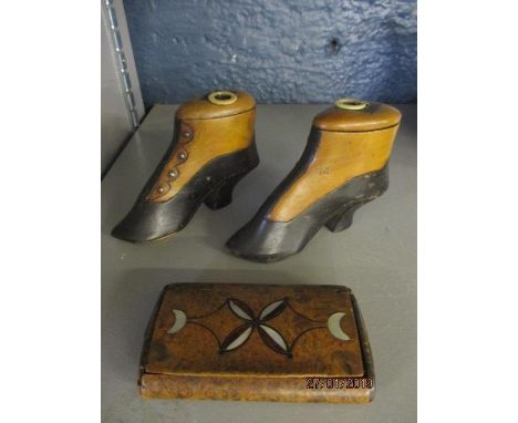 A pair of stained treen snuff boxes fashioned as ladies shoes and a walnut and tortoiseshell snuff box 