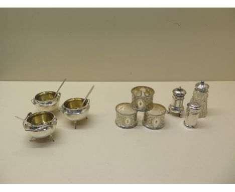 Three silver cauldron shaped salts Birmingham 1940/41 H.P &amp; Co with three silver ladle spoons, same year with two peppers