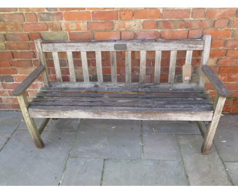 A vintage teak R. A. Lister wooden garden bench dated 1970 - no play in joints - Width 147cm x Depth 52cm x Height 83cm 
