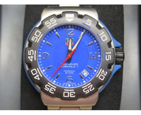A Tag Heuer Formula 1 quartz gents bracelet wristwatch with blue dial model WAC 1112 serial SF6825 with card dated 2012 - boo