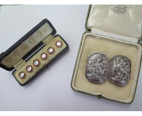 A Nepalese white metal 2 part buckle, 7.5cm wide, approx 38 grams and a boxed set of gilt metal enamel and mother of pearl wa